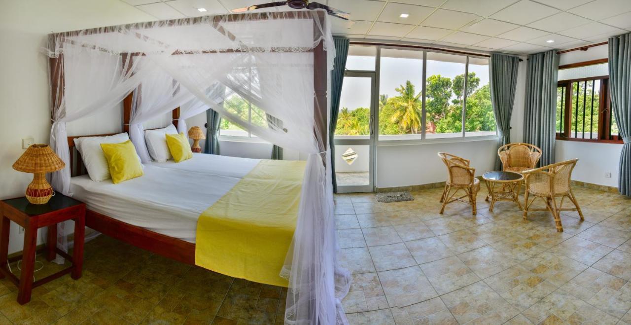 Villa Gamini Хиккадува Экстерьер фото
